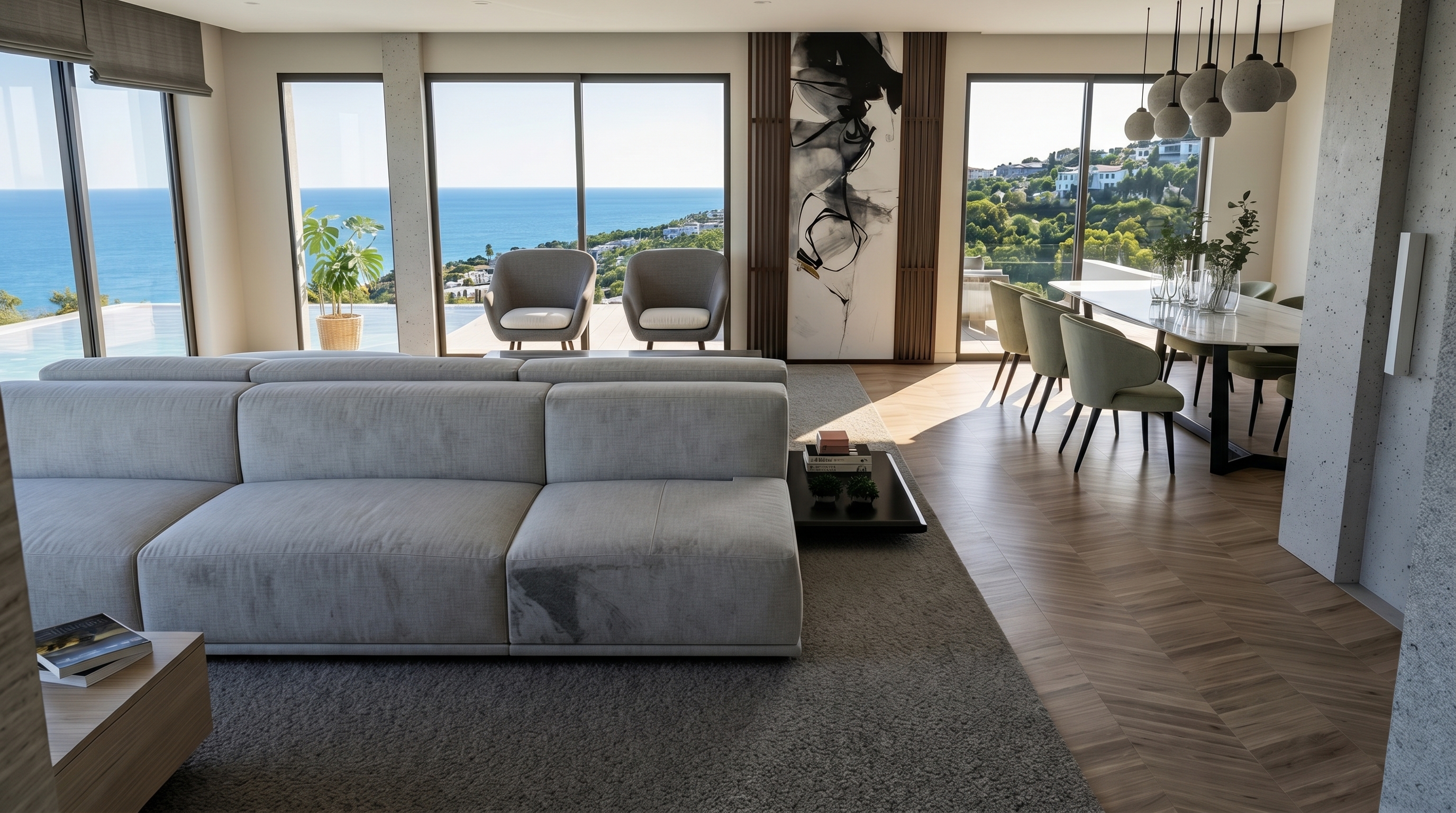 Open-plan living and dining with herringbone oak floors and full-height glass to the sea.